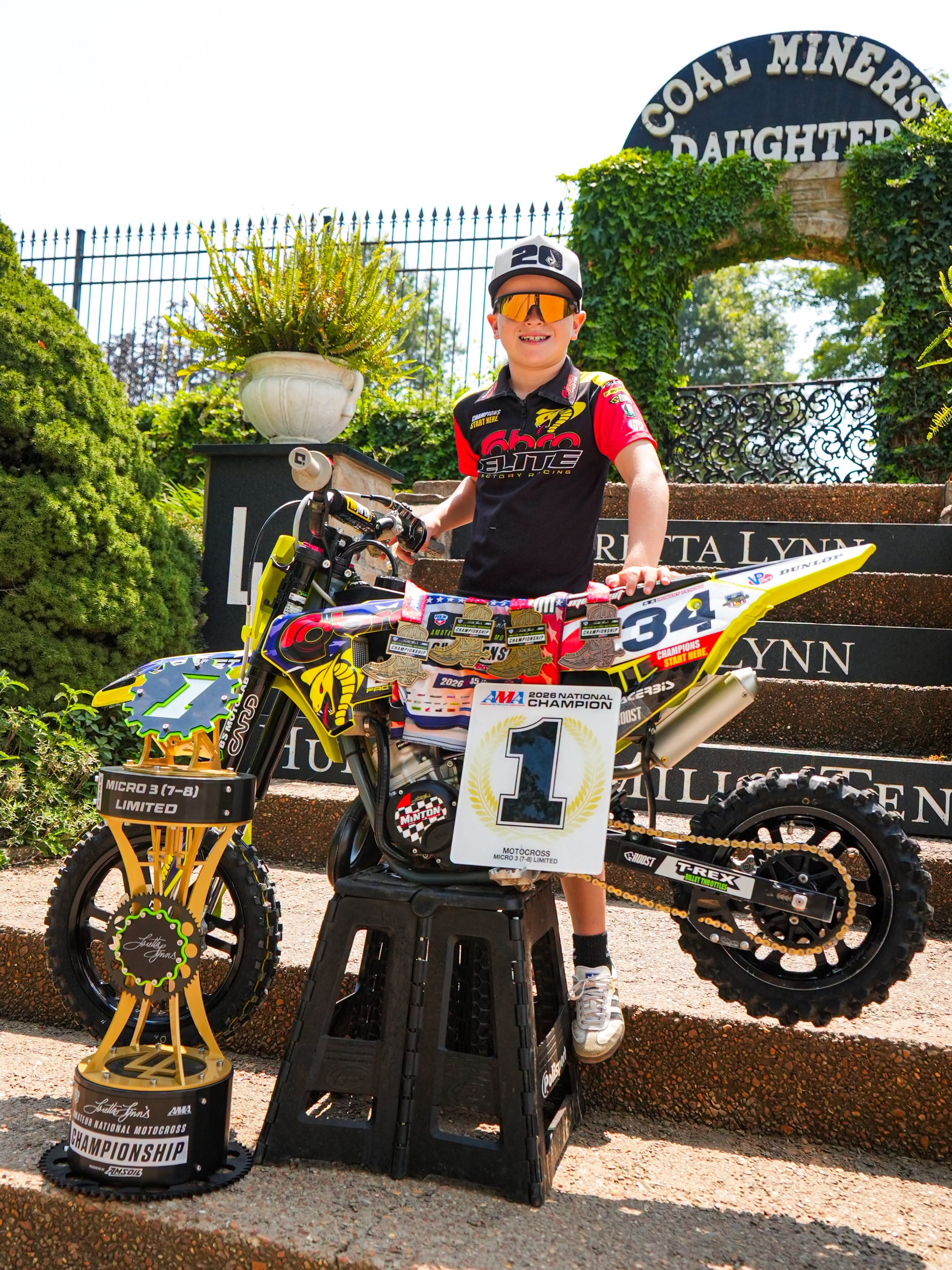 Robert Fender with his 2026 championship trophy and bike